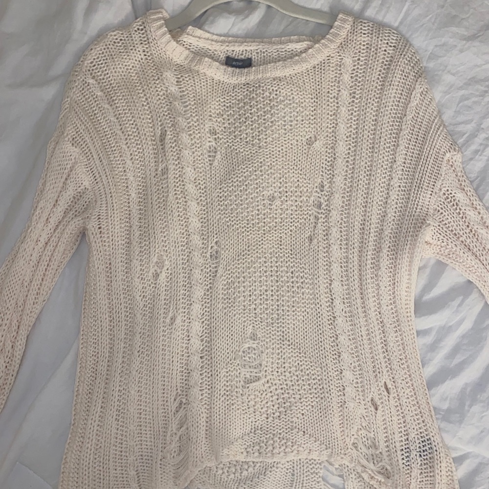 Distressed cable knit sweater from Aerie